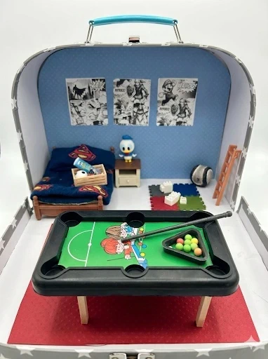 boys games room in suitcase